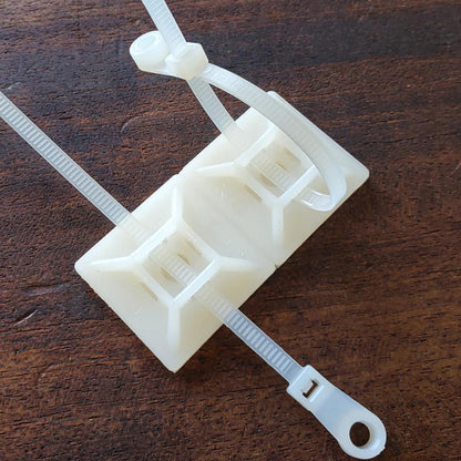 Mounting Base:  1.1"x1.1"x0.28, 4-way adh. & #10 screw, natural (Bag of 100)  (White)